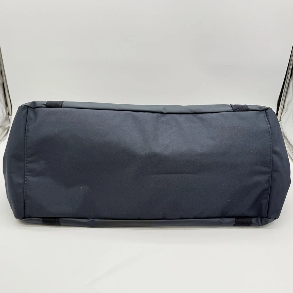 Away F.A.R. Duffle 55L Navy Blue Active Travel Duffel Backpack Bag
